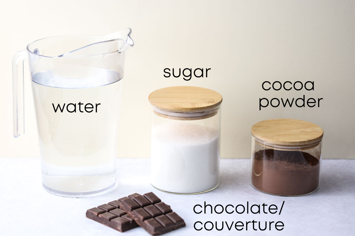 shows the ingredients for the chocolate sorbet recipe: water, sugar, cocoa poder, chocolate
